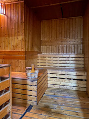 Vertical photo of cozy sauna room in spa or gym