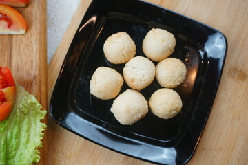 fried ball tofu red tomato sauce background top view