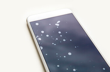 Badly installed smartphone protection screen with dust particles between protection glass and touch...