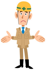 呆れるヘルメットを被ったベージュの作業着の男性
