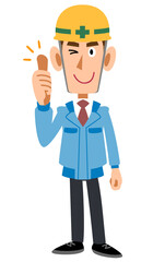 サムズアップするヘルメットを被った作業着の男性
