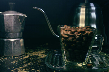 manual tools for processing a cup of coffee, ranging from coffee cups, mocha pots to make espresso, kettle with goose neck to pour water stably, manual coffee grinder with various sizes of powder.