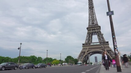 Day Traffic on the Parisian Bridge Near the Eiffel Tower. Fast Motion