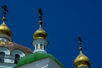 Fototapeta na wymiar Details of domes atop Church of Saint Anthony and Theodosius or Refectory Church, Caves Monastery, Kyiv, Ukraine