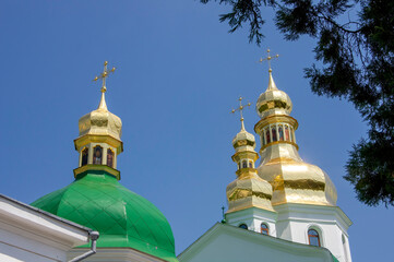 Fototapeta na wymiar Detail of the domes on the Church of the Nativity of the Blessed Virgin Mary, Cave Monastery, Kyiv, Ukraine