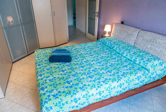 Typical modern bedroom interior for vacation rental in Italy