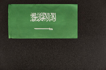 Flag of Saudi Arabia on black background. Kingdom of Saudi Arabia. Green flag with sword