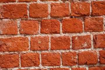 Close up view of ancient brick wall. Red brick textured background.