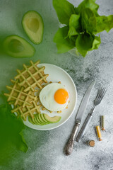 Fresh delicious and nutritious breakfast with waffles with spinach