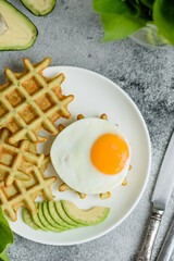 Fresh delicious and nutritious breakfast with waffles with spinach
