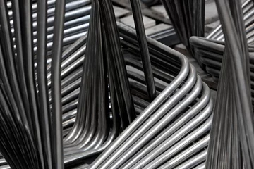 Fotobehang Office Furniture Industry. Metal parts of chairs.  Steel frames. Pipes © A
