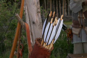 leather bow quiver with feathered arrows, viking longbow, archery