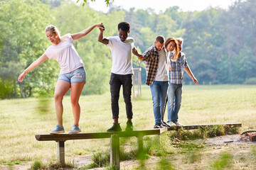 Team balancing on trim you course