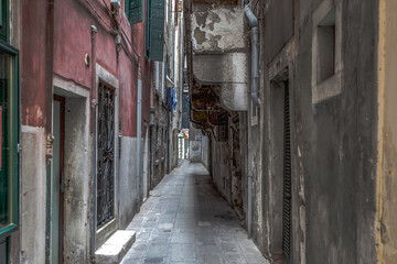 Fototapeta na wymiar Medieval street in Venice.