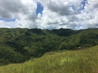 Sumba landcape, horses in savana, waterfalls