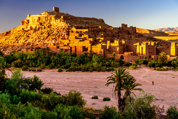 Fototapeta na wymiar Sunset at the Aït Benhaddou. It is a fortified village along the former caravan route between the Sahara and Marrakech in present-day Morocco. It has been a UNESCO World Heritage Site since 1987.