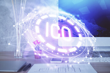 Double exposure of blockchain and crypto economy theme hologram and table with computer background....