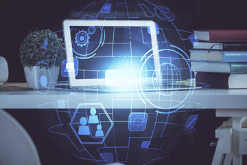 Computer on desktop with social network hologram. Double exposure. Concept of international people connections.