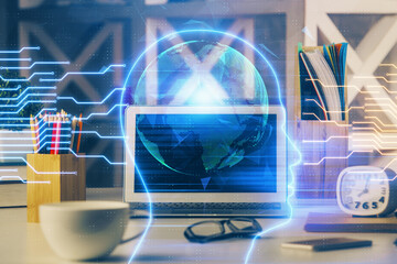 Double exposure of work space with computer and human brain drawing hologram. Brainstorm concept.