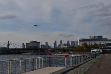 Fototapeta na wymiar airplane comming to landing at City airport, London, England, Great Britain (United Kingdom - UK)