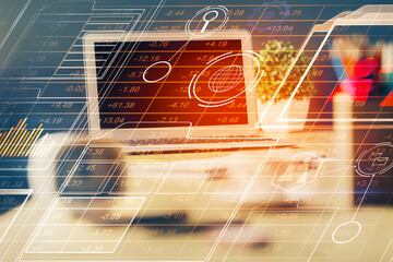 Double exposure of desktop computer and technology theme hologram. Concept of software development.