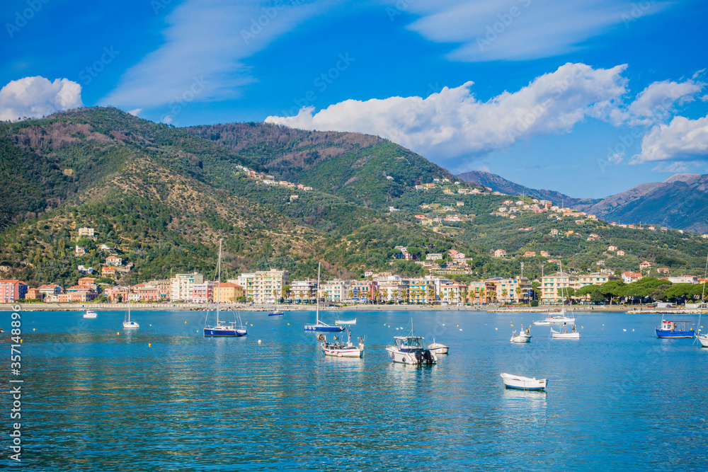 Wall mural Sestri Levante, IT: Citta Dei Due Mari (City of the Two Seas) with Baia del Silenzio (Bay of Silence) and Baia delle Favole (Bay of the Fables) Sea harbor, beach, downtown. Liguria Italy