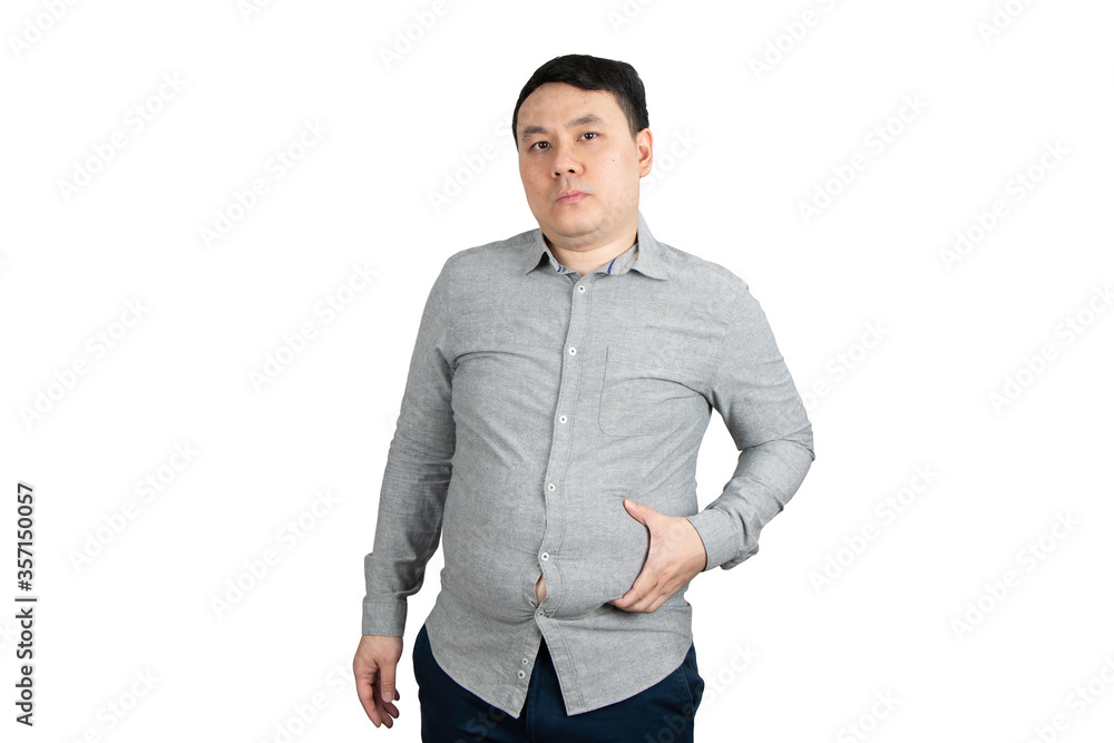 Wall mural unhappy young overweight man with a big belly isolated on white background.