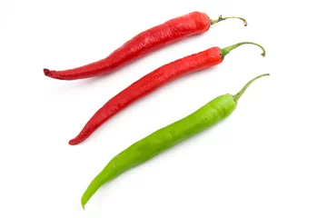 Fotobehang Fresh green chili pepper and dry red chili pepper. Isolated on white background. © Muhammad