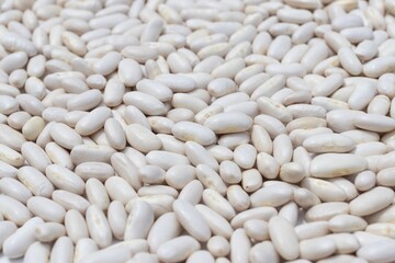Solid background of white bean grains