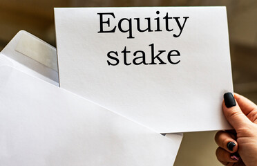 EQUITY STAKE word written in letter from envelope