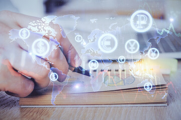 Multi exposure closeup hands with stock market forex graph.