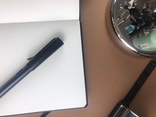 notebook and pen in office situation