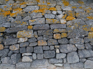 A wall of stones in the west of France. Batz-sur-Mer, a city located in the west of France.