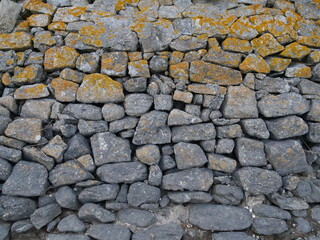 A wall of stones in the west of France. Batz-sur-Mer, a city located in the west of France.