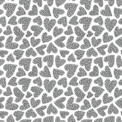 Seamless pattern with hand drawn monochrome hearts