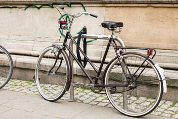 Naklejka na ściany i meble Europa, View of some bycicle, fixed in a city center street.