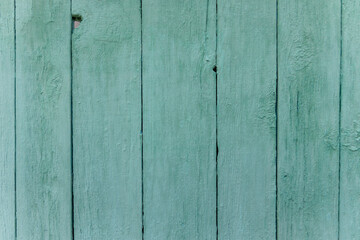 Wooden vertical striped desk painting mint pastel color. Texture