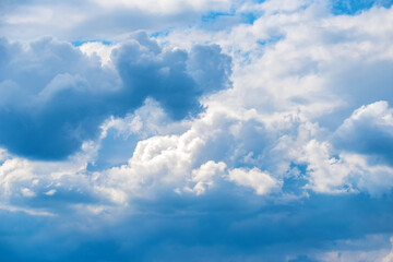 Fototapeta na wymiar Heavenly blue sky with white clouds background