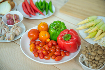Fresh vegetable and fruit on wooden table in kitchen