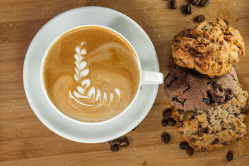 Americano with milk. Coffee with milk. Coffee with cookies