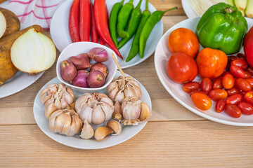 Fresh vegetable and fruit on wooden table in kitchen
