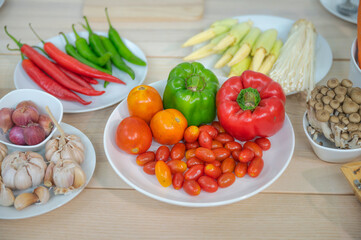 Fresh vegetable and fruit on wooden table in kitchen