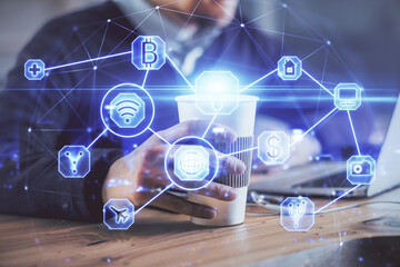 Media network theme hologram with man working on computer on background. Concept of internet communication. Double exposure.