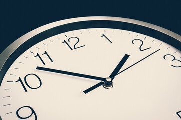 Close-up view of clock - deadline and time concept