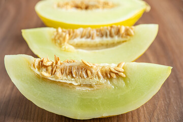 Yellow melon on a wooden table