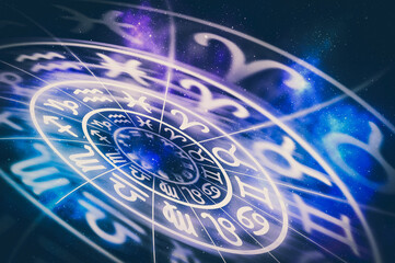 Zodiac signs inside of horoscope circle on universe background