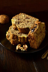 Banana bread with walnut and chocolate, vertical, copy space