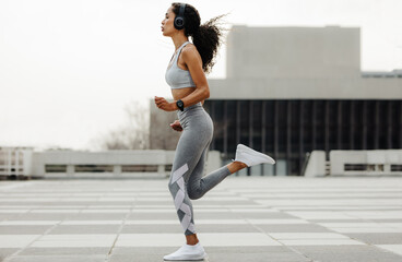 Woman on morning run in the city