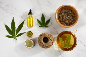 Flat lay composition from hemp, cannabis products. Cosmetic and drink. Top view