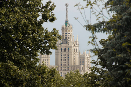 Building of the Communist University in Moscow. Moscow State University surrounded autumn trees
